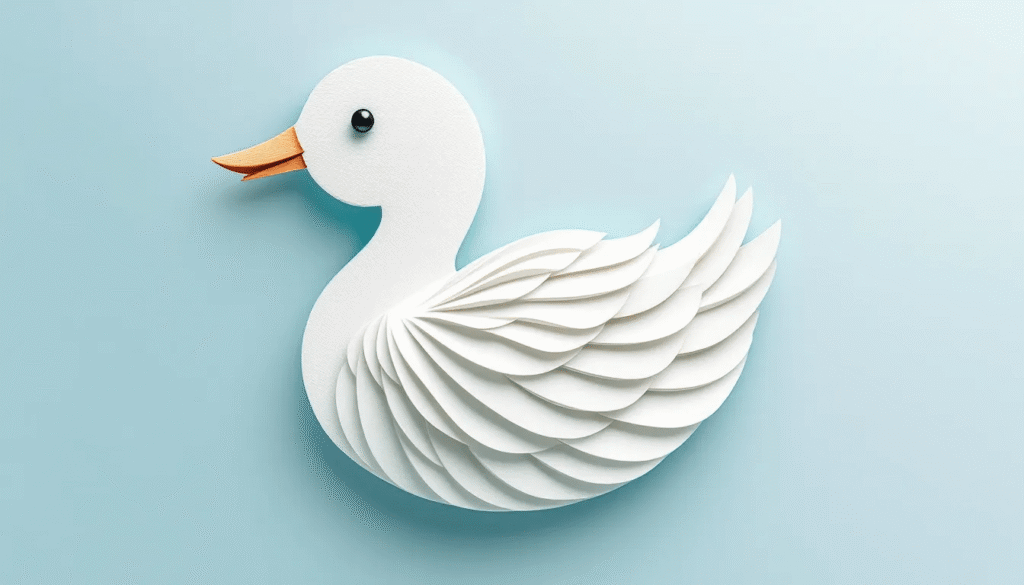 Top down imaage of a white paper duck.