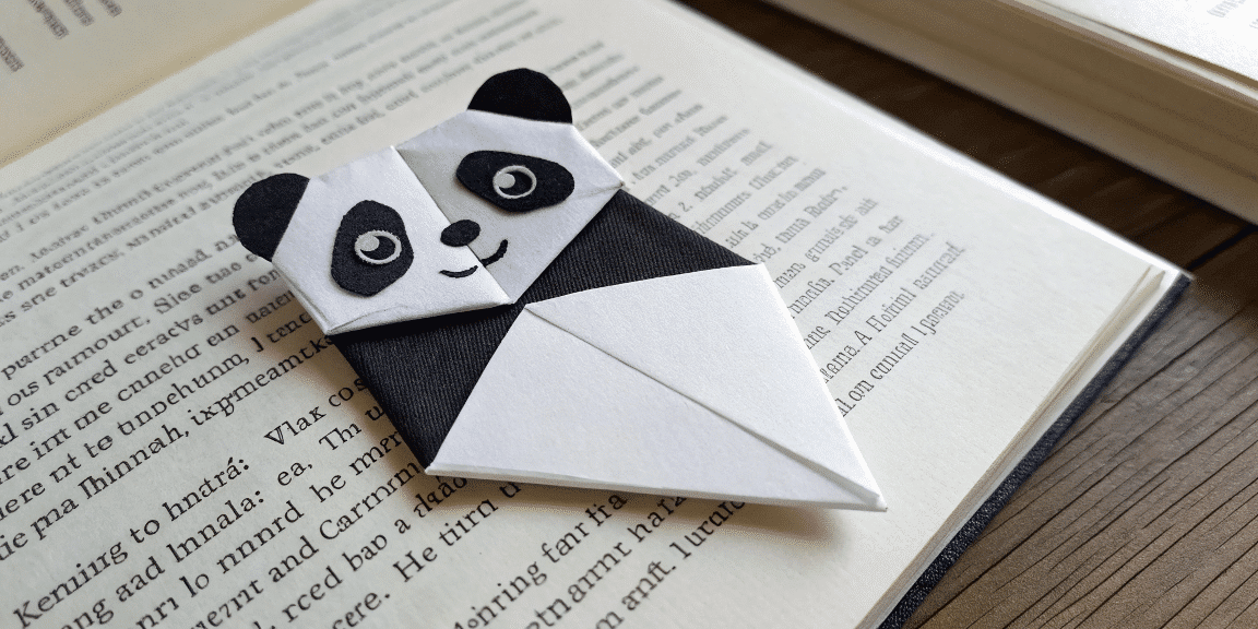 3d9fda7682914029874a7af0df5764c5 simply paper crafts A photo featuring a creative origami panda figurine with a playful and artistic touch