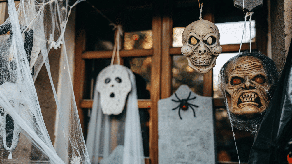 43046a384d04487f907e6e5477413972 simply paper crafts Halloween scary paper mache masks hanged outside on a door