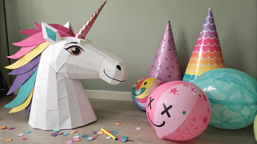 Aa8a45ed88614cb4be22557bbd2eef98 simply paper crafts Unicorn head paper mache in a living room