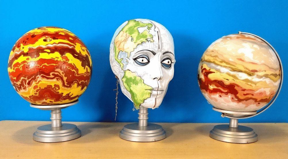 B3933730ad3548c7ab26fde2dc835419 simply paper crafts Paper mache of planet models and a face