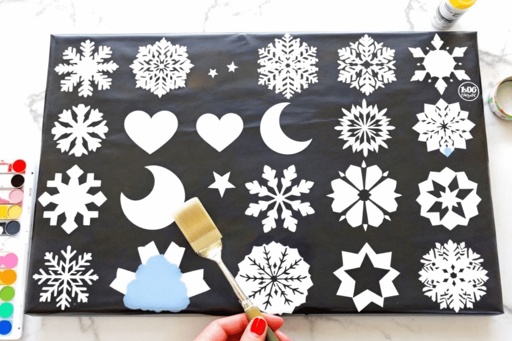 Image simply paper crafts Wrapping paper with designs of holiday shapes stars and hearts