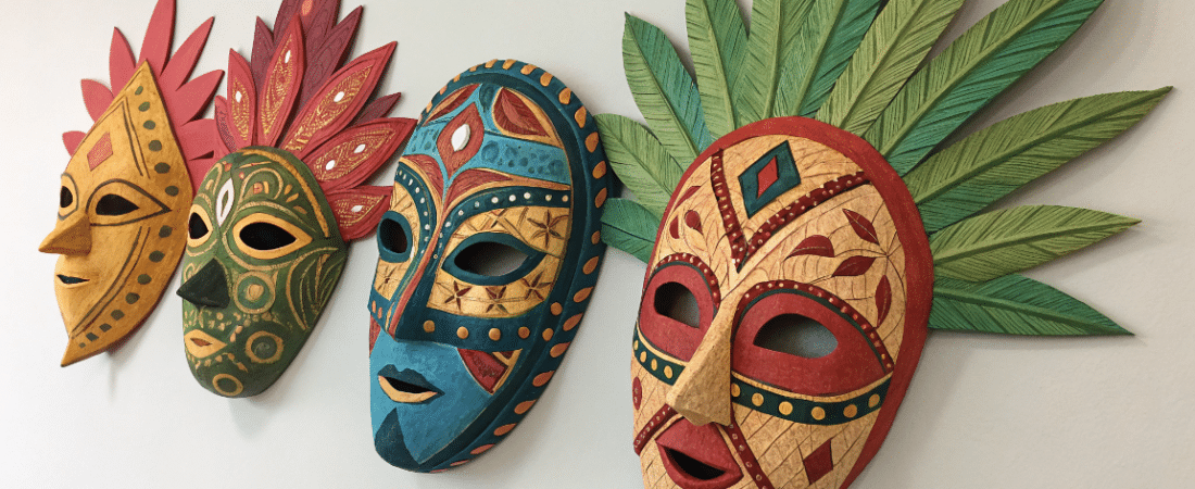 Paper mache masks simply paper crafts A photo of a collection of colorful paper mache masquerade masks with a variety of colors and patterns featuring shades of yellow green and red