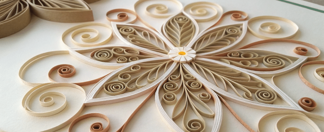 A photo of a close up view of a detailed intricate paper craft with a design inspired by floral patterns