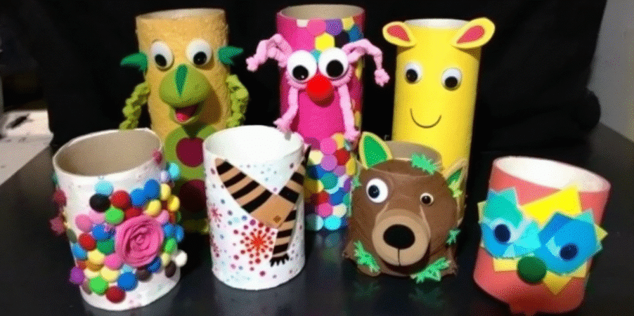 Toilet paper roll crafts simply paper crafts A photograph of a collection of handmade colorful craft items designed to resemble various characters The items are crafted from toilet paper roll and have a playful artistic appearance The colors are vibrant and varied with a mix of traditional and imaginative designs
