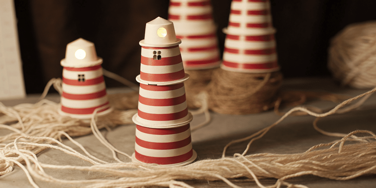 0f571f9548b4497d8dadabe180fb15dd simply paper crafts Paper cups designed like a lighthouse stacked on each other