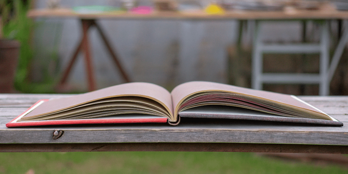 89b9a86c1be7485cb9e161b109d82bea simply paper crafts Large sketchbook on a wooden table
