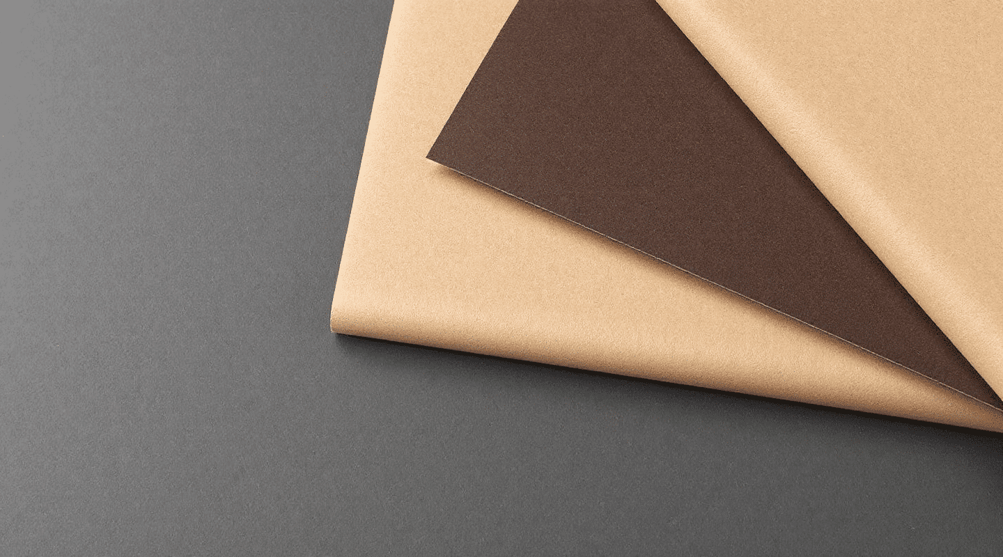 Brown Kraft paper on a grey background.