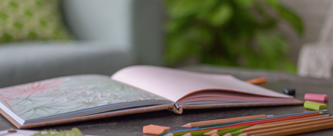 Best drawing ideas simply paper crafts drawing book on a table surrounded by pencils