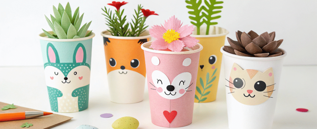 A photograph of a still life featuring a variety of paper cups with different colors designs and styles arranged on a table