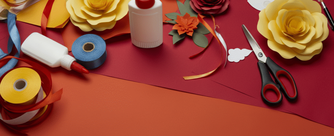 Crafts for cheap simply paper crafts Craft supplies on a colorful table glue ribbons scissors and paper flowers