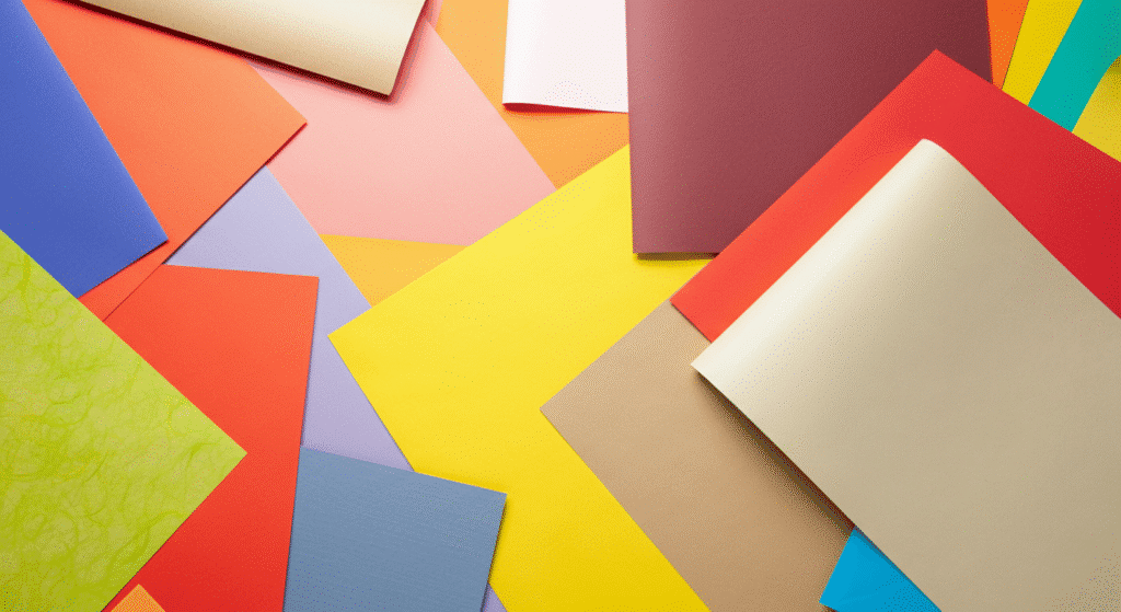 Different papers you can use simply paper crafts Colorful sheets of paper in various shades including red blue green yellow and brown