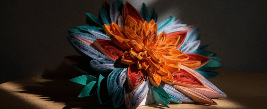 Artwork made by paper simply paper crafts Colorful paper flower made from rolled and layered paper in orange pink and blue hues