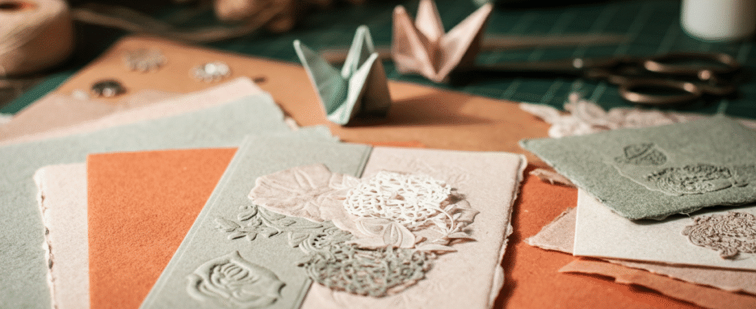 Homemade paper simply paper crafts Photograph showcasing a collection of beautifully handcrafted cards and paper crafts on a rustic workbench evoking creativity calm and artisanal quality