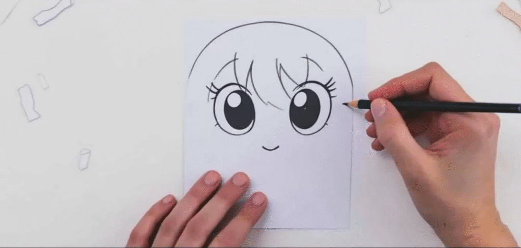 Anime paper puppet eyes simply paper crafts An illustration showing the process of designing an anime paper puppet featuring a simple sketch of a character with large expressive eyes and a charming handmade look The image highlights key features like the mouth and hair emphasizing the playful and creative aspects of crafting your own paper doll