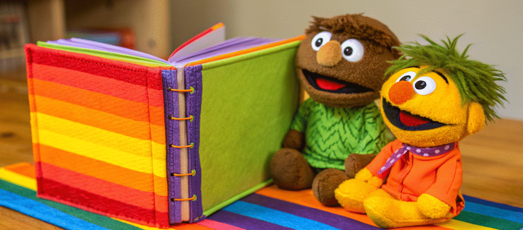 Colorful puppet book simply paper crafts A Colorful Puppet characters next to a book