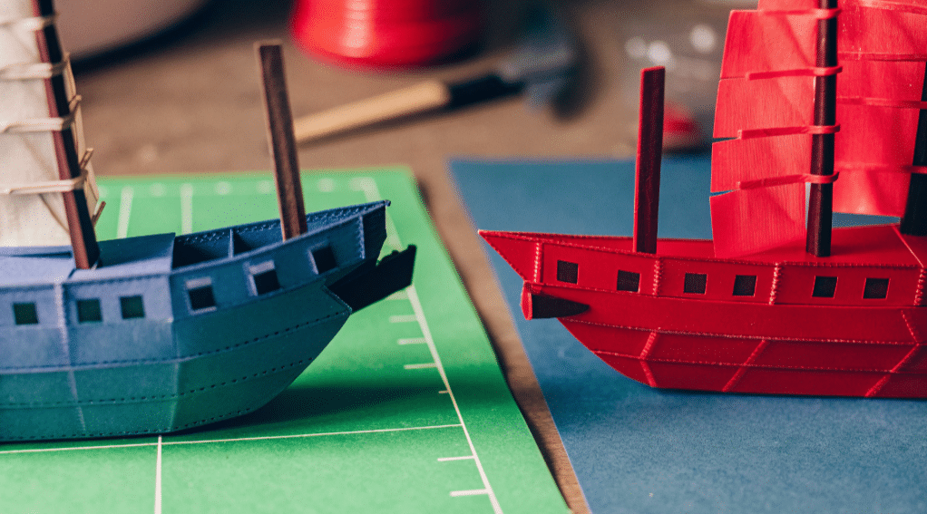 Creating the ship base simply paper crafts A partially constructed pirate ship base made from paper