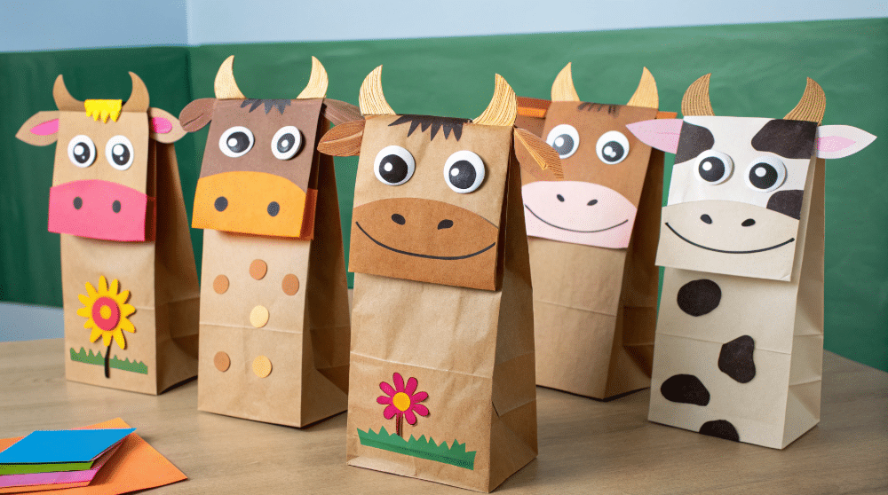 Fun variations to try simply paper crafts The image features a colorful display of various cow paper bag puppets showcasing fun and creative variations made from brown paper bags These easy crafts are perfect for kids ideal for classroom activities or home crafting sessions and invite imaginative play with farm animals