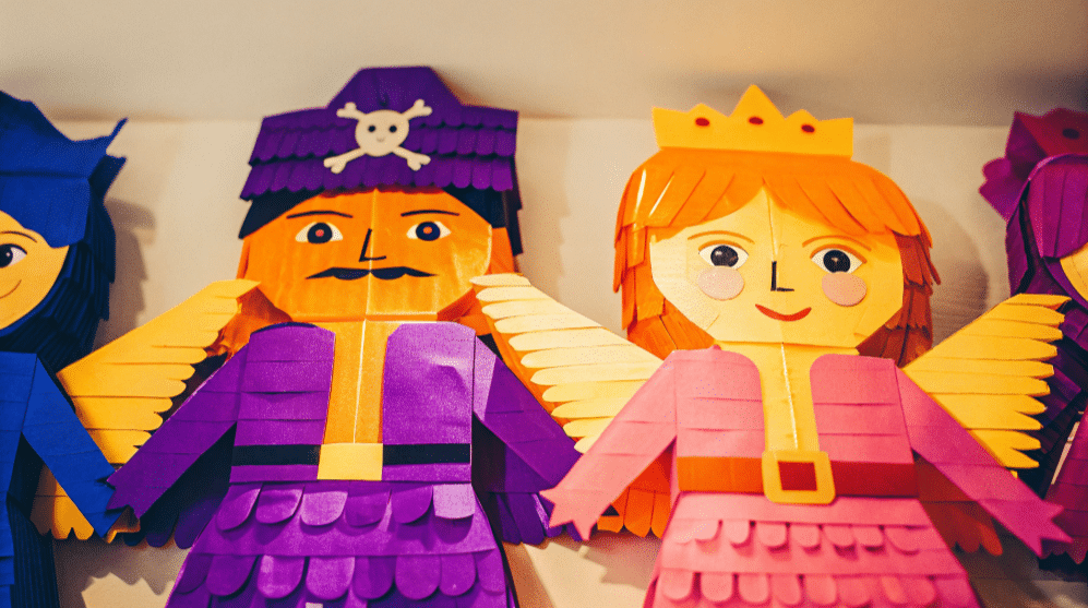 Storybook character puppets simply paper crafts A collection of colorful storybook character puppets made from paper and craft supplies