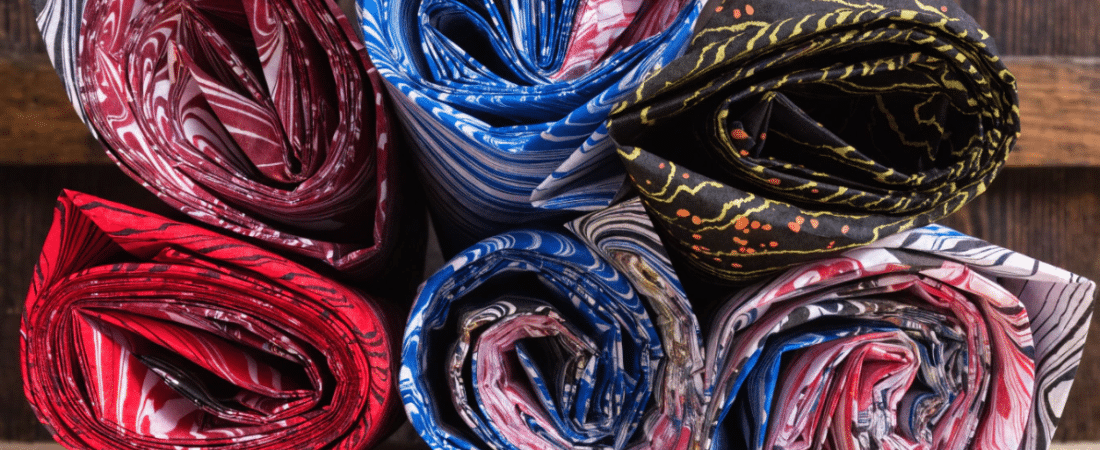 French marbled paper Different colored french marbled paper rolled up