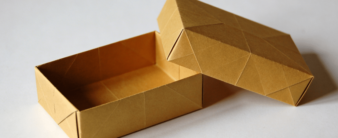 A yellow origami box