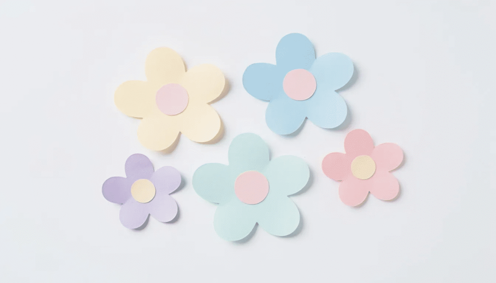 Image The image features classic petal paper flowers characterized by their simple rounded petals arranged symmetrically around a central circle embodying the charm of DIY crafts for home decor and spring decorations These versatile flowers can be used in bouquets centerpieces or wreaths making them perfect for various occasions and projects